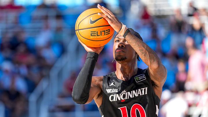 Cincinnati Bearcats guard Tylen Riley (10) shoots from three point range in the first half of the CareSource Invitational exhibition game between the Cincinnati Bearcats and the Ohio State Buckeyes at the Lindner Family Tennis Center in Mason, Ohio, Wednesday, Oct. 7, 2026. The Bearcats won 79-68. Cincinnati Bearcats guard Tylen Riley (10) shoots from three point range in the first half of the CareSource Invitational exhibition game between the Cincinnati Bearcats and the Ohio State Buckeyes at the Lindner Family Tennis Center in Mason, Ohio, Wednesday, Oct. 7, 2026. The Bearcats won 79-68.