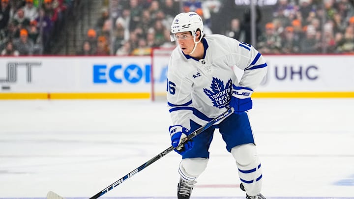 Nov 3, 2024; Saint Paul, Minnesota, USA; Toronto Maple Leafs right wing Mitch Marner (16) looks to pass during the first period against the Minnesota Wild at Xcel Energy Center. Mandatory Credit: Brace Hemmelgarn-Imagn Images