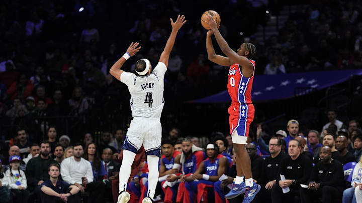 Dec 6, 2024; Philadelphia, Pennsylvania, USA; Philadelphia 76ers guard Tyrese Maxey (0) shoots the ball against Orlando Magic guard Jalen Suggs (4) in the first quarter at Wells Fargo Center. Mandatory Credit: Kyle Ross-Imagn Images Dec 6, 2024; Philadelphia, Pennsylvania, USA; Philadelphia 76ers guard Tyrese Maxey (0) shoots the ball against Orlando Magic guard Jalen Suggs (4) in the first quarter at Wells Fargo Center. Mandatory Credit: Kyle Ross-Imagn Images