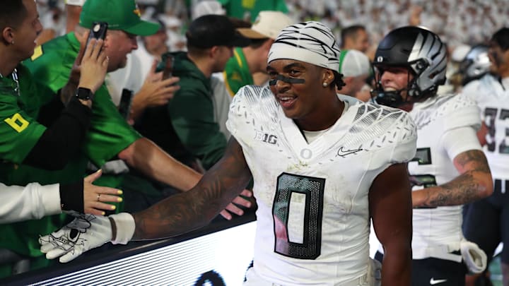 Sep 27, 2025; University Park, Pennsylvania, USA; Oregon Ducks running back Jordon Davison (0) reacts after defeating the Penn State Nittany Lions at Beaver Stadium. Mandatory Credit: Matthew O'Haren-Imagn Images Sep 27, 2025; University Park, Pennsylvania, USA; Oregon Ducks running back Jordon Davison (0) reacts after defeating the Penn State Nittany Lions at Beaver Stadium. Mandatory Credit: Matthew O'Haren-Imagn Images
