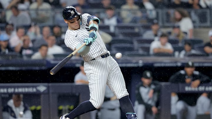 Sep 24, 2025; Bronx, New York, USA; New York Yankees right fielder Aaron Judge (99) hits a solo home run against the Chicago White Sox during the eighth inning at Yankee Stadium. The home run was his second of the game. Mandatory Credit: Brad Penner-Imagn Images
