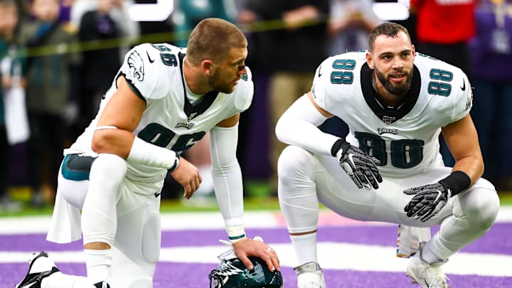 Oct 13, 2019; Minneapolis, MN, USA; Philadelphia Eagles tight end Zach Ertz (86) and tight end Dallas Goedert (88) talk before the start of a game against the Minnesota Vikings at U.S. Bank Stadium. Mandatory Credit: David Berding-Imagn Images