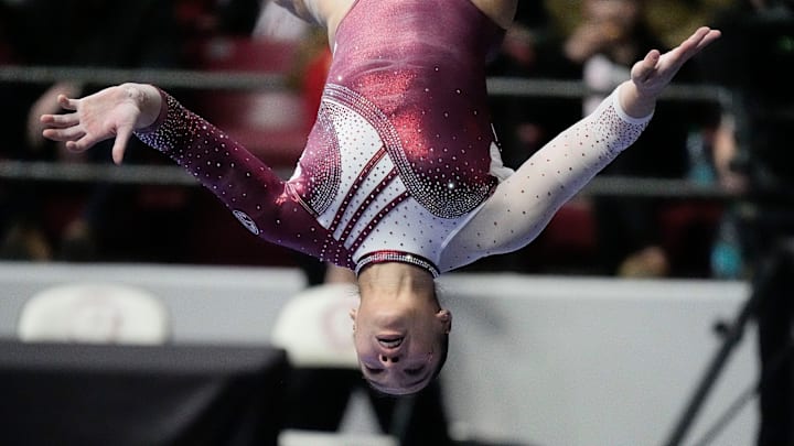 Alabama's Corinne Bunagan performs on the beam during the meet with Oklahoma Friday, Jan. 24, 2025, at Coleman Coliseum in Tuscaloosa, Alabama.