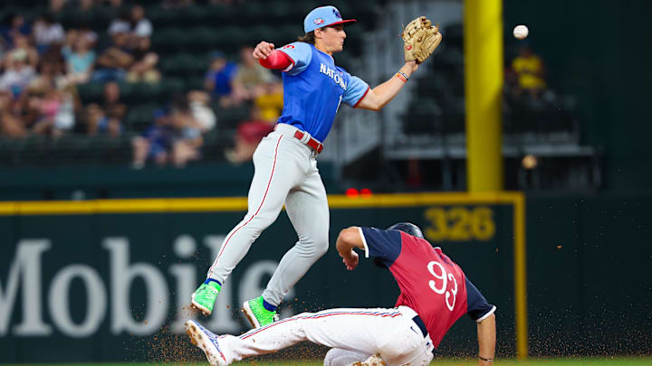 Jul 13, 2024; Arlington, TX, USA;  American League Future  outfielder Spencer Jones (93) steals second base ahead of the tag by National League Future  infielder Aidan Miller (10) during the fourth inning during the Major league All-Star Futures game at Globe Life Field.