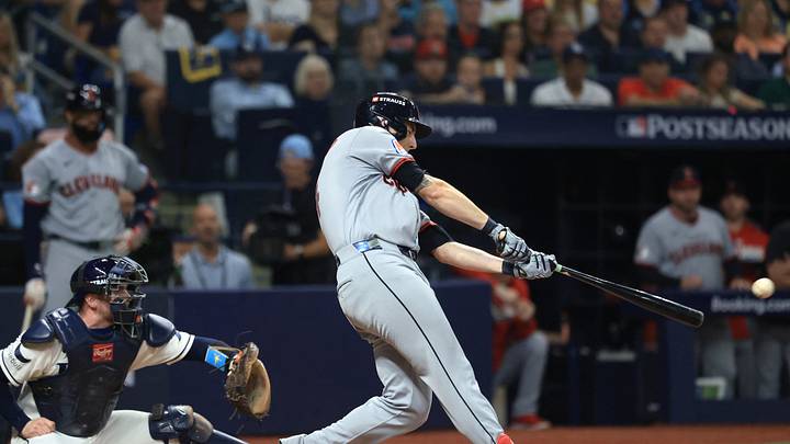 Oct 12, 2026; St. Petersburg, Florida, USA;  Cleveland Guardians outfielder Chase DeLauter (24) hits a double during the eighth inning against the Tampa Bay Rays at Tropicana Field.  Mandatory Credit: Kim Klement Neitzel-Imagn Images