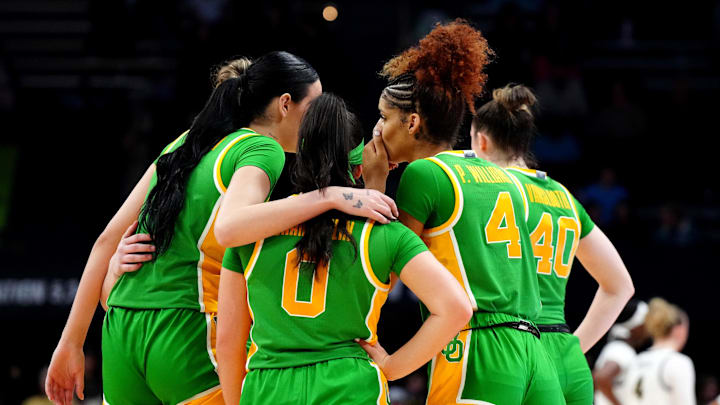 Feb 9, 2024; Boulder, Colorado, USA; Members of the Oregon Ducks huddle in the second half against the Colorado Buffaloes at CU Events Center. Mandatory Credit: Ron Chenoy-USA TODAY Sports