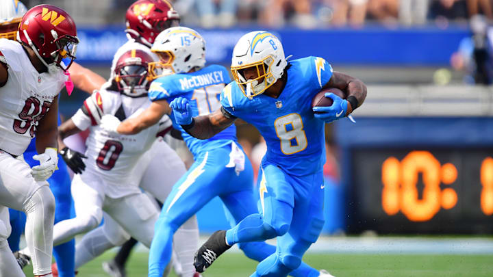 Oct 5, 2025; Inglewood, CA; Los Angeles Chargers running back Omarion Hampton runs against the Washington Commanders in the first half at SoFi Stadium