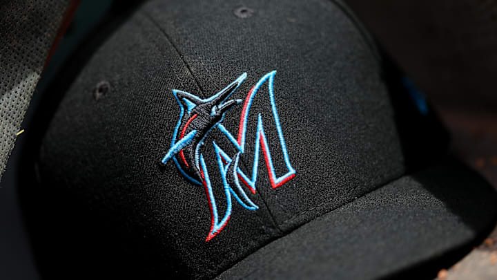 Apr 11, 2019; Cincinnati, OH, USA; A view of a New Era Miami Marlins hat in the dugout during the game against the Cincinnati Reds at Great American Ball Park. Mandatory Credit: Aaron Doster-Imagn Images