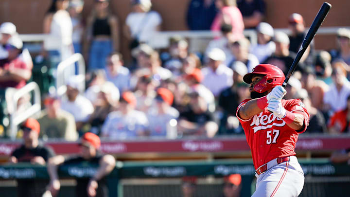 Cincinnati Reds outfielder Rece Hinds (57) hits the ball int the sixth inning of a Cactus League game between the Cincinnati Reds and San Francisco Giants, Sunday, Feb. 23, 2025, at Scottsdale Stadium in Scottsdale, Ariz. Giants won 5-2.