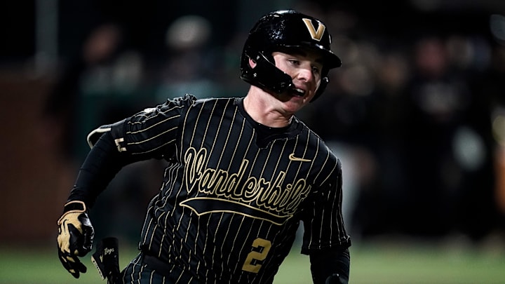 Vanderbilt right fielder Logan Johnstone (2) runs to first after hitting the game winning RBI-single against Tennessee during the tenth inning at Hawkins Field in Nashville, Tenn., Friday, March 27, 2026.