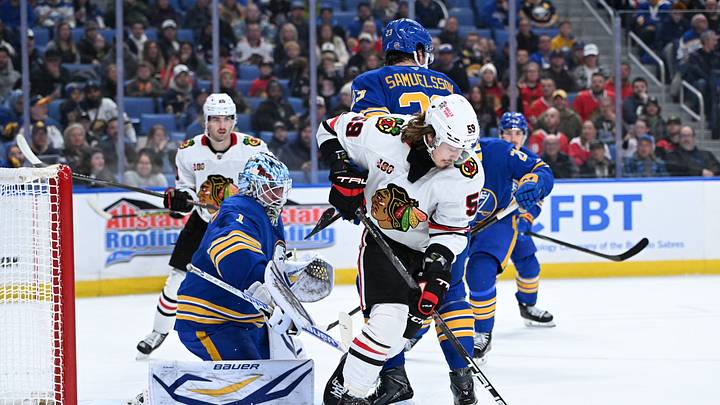 Nov 21, 2025; Buffalo, New York, USA; Chicago Blackhawks left wing Tyler Bertuzzi (59) gets control of the puck in front of Buffalo Sabres goaltender Ukko-Pekka Luukkonen (1) in the first period at KeyBank Center. Mandatory Credit: Mark Konezny-Imagn Images