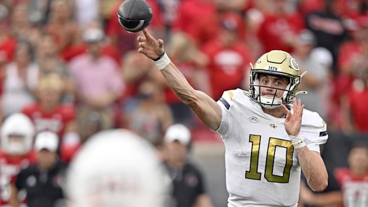 Sep 21, 2024; Louisville, Kentucky, USA;  Georgia Tech Yellow Jackets quarterback Haynes King (10) attempts a pass against the Louisville Cardinals during the second half at L&N Federal Credit Union Stadium. Mandatory Credit: Jamie Rhodes-Imagn Images