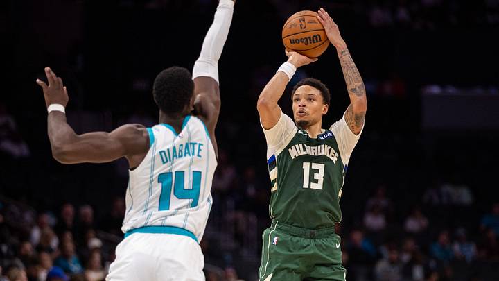 Oct 11, 2026; Charlotte, North Carolina, USA; Milwaukee Bucks guard Ryan Rollins (13) shoots against the Charlotte Hornets during the second quarter at Spectrum Center. Mandatory Credit: Scott Kinser-Imagn Images Oct 11, 2026; Charlotte, North Carolina, USA; Milwaukee Bucks guard Ryan Rollins (13) shoots against the Charlotte Hornets during the second quarter at Spectrum Center. Mandatory Credit: Scott Kinser-Imagn Images