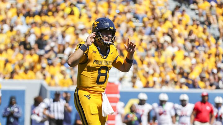 Aug 30, 2025; Morgantown, West Virginia, USA; West Virginia Mountaineers quarterback Nicco Marchiol (8) calls out a play during the first quarter against the Robert Morris Colonials at Milan Puskar Stadium. Mandatory Credit: Ben Queen-Imagn Images