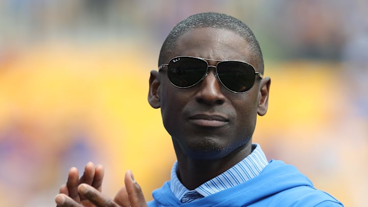Sep 27, 2025; Pittsburgh, Pennsylvania, USA;  Pittsburgh Panthers Director of Athletics Allen Greene cheers the Panthers against the Louisville Cardinals during the second quarter at Acrisure Stadium. Mandatory Credit: Charles LeClaire-Imagn Images