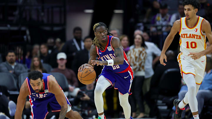 Nov 18, 2024; Sacramento, California, USA; Sacramento Kings guard Keon Ellis (23) steals the ball from Atlanta Hawks forward Zaccharie Risacher (10) during the third quarter at Golden 1 Center. Mandatory Credit: Sergio Estrada-Imagn Images