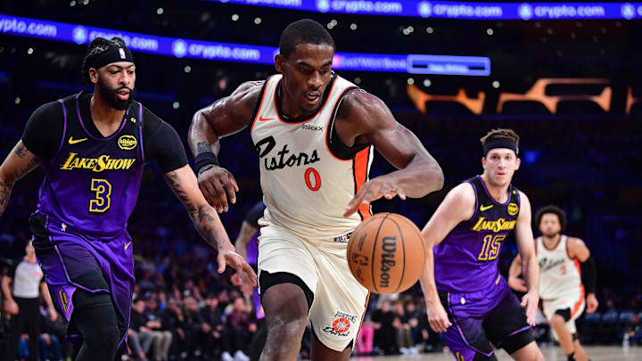 Dec 23, 2024; Los Angeles, California, USA; Detroit Pistons center Jalen Duren (0) moves in for the ball ahead of Los Angeles Lakers forward Anthony Davis (3) during the first half at Crypto.com Arena. Mandatory Credit: Gary A. Vasquez-Imagn Images Dec 23, 2024; Los Angeles, California, USA; Detroit Pistons center Jalen Duren (0) moves in for the ball ahead of Los Angeles Lakers forward Anthony Davis (3) during the first half at Crypto.com Arena. Mandatory Credit: Gary A. Vasquez-Imagn Images