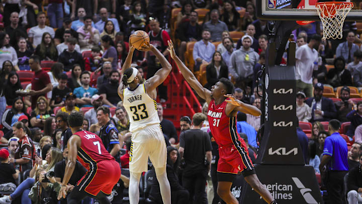 Nov 30, 2023; Miami, Florida, USA; Indiana Pacers center Myles Turner (33) shoots the basketball over Miami Heat center Thomas Bryant (31) during the third quarter at Kaseya Center. Mandatory Credit: Sam Navarro-Imagn Images Nov 30, 2023; Miami, Florida, USA; Indiana Pacers center Myles Turner (33) shoots the basketball over Miami Heat center Thomas Bryant (31) during the third quarter at Kaseya Center. Mandatory Credit: Sam Navarro-Imagn Images