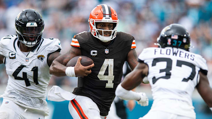 Sep 15, 2024; Jacksonville, Florida, USA; Cleveland Browns quarterback Deshaun Watson (4) runs against Jacksonville Jaguars defensive end Josh Hines-Allen (41) and cornerback Tre Flowers (37) in the fourth quarter at EverBank Stadium. Sep 15, 2024; Jacksonville, Florida, USA; Cleveland Browns quarterback Deshaun Watson (4) runs against Jacksonville Jaguars defensive end Josh Hines-Allen (41) and cornerback Tre Flowers (37) in the fourth quarter at EverBank Stadium.