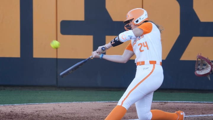Tennessee infielder McKenna Gibson (24) hits a two-run home run during an NCAA softball game between Tennessee and Arkansas at Sherri Parker Lee Stadium on Saturday, March 22, 2025. Tennessee infielder McKenna Gibson (24) hits a two-run home run during an NCAA softball game between Tennessee and Arkansas at Sherri Parker Lee Stadium on Saturday, March 22, 2025.