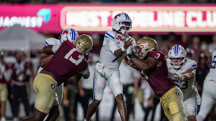Florida State Seminoles defensive lineman Deamontae Diggs (13) and Florida State Seminoles defensive lineman Mandrell Desir (3) put pressure on the SMU Mustangs quarterback to pass. The SMU Mustangs lead the Florida State Seminoles 17-10 at the end of the first half Monday, Sept. 7, 2026. Florida State Seminoles defensive lineman Deamontae Diggs (13) and Florida State Seminoles defensive lineman Mandrell Desir (3) put pressure on the SMU Mustangs quarterback to pass. The SMU Mustangs lead the Florida State Seminoles 17-10 at the end of the first half Monday, Sept. 7, 2026.