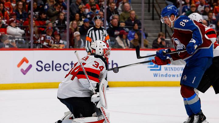 Oct 28, 2026; Denver, Colorado, USA; New Jersey Devils goaltender Jake Allen (34) makes a save as Colorado Avalanche center Martin Necas (88) looks on in the second period at Ball Arena. Mandatory Credit: Isaiah J. Downing-Imagn Images Oct 28, 2026; Denver, Colorado, USA; New Jersey Devils goaltender Jake Allen (34) makes a save as Colorado Avalanche center Martin Necas (88) looks on in the second period at Ball Arena. Mandatory Credit: Isaiah J. Downing-Imagn Images