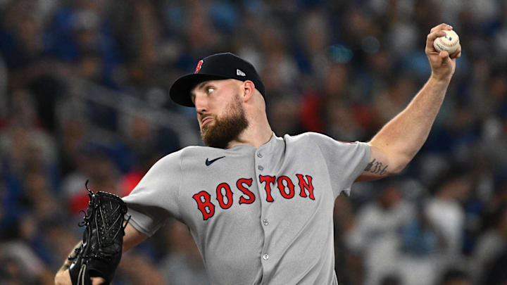 Sep 24, 2025; Toronto, Ontario, CAN;  Boston Red Sox starting pitcher Garrett Crochet (35) delivers a pitch against the Toronto Blue Jays in the fourth inning at Rogers Centre. Mandatory Credit: Dan Hamilton-Imagn Images