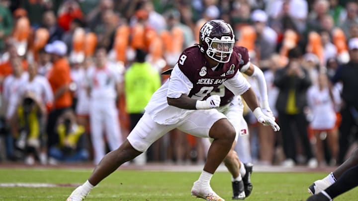 Dec 20, 2025; College Station, TX, USA; Texas A&M Aggies defensive end Cashius Howell (9) rushes the line during the game between the Aggies and the Hurricanes at Kyle Field. Mandatory Credit: Jerome Miron-Imagn Images