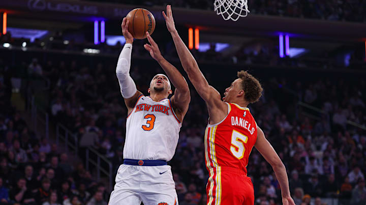 Jan 20, 2025; New York, New York, USA; New York Knicks guard Josh Hart (3) goes to the basket against Atlanta Hawks guard Dyson Daniels (5) during the first half at Madison Square Garden. Mandatory Credit: Vincent Carchietta-Imagn Images