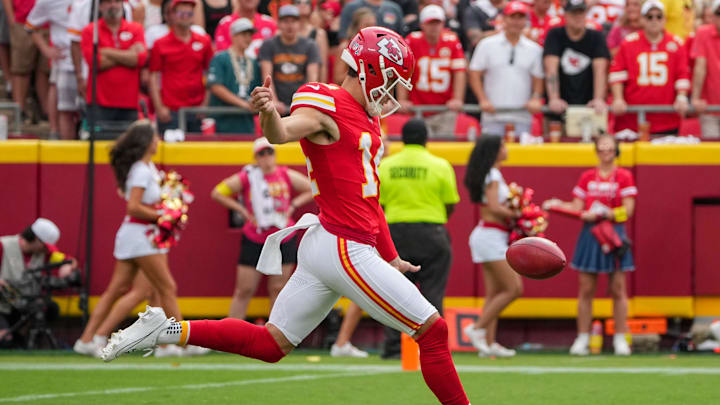 Sep 14, 2025; Kansas City, Missouri, USA; Kansas City Chiefs punter Matt Araiza (14) punts the ball against the Philadelphia Eagles during the game at GEHA Field at Arrowhead Stadium. Mandatory Credit: Denny Medley-Imagn Images