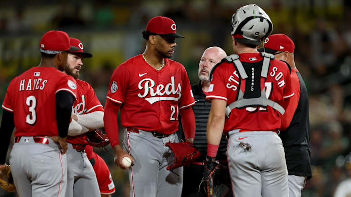 Sep 13, 2025; West Sacramento, California, USA; Team members check on Cincinnati Reds starting pitcher Hunter Greene (21) after getting hit by a line drive against the Athletics during the third inning at Sutter Health Park. Mandatory Credit: Dennis Lee-Imagn Images Sep 13, 2025; West Sacramento, California, USA; Team members check on Cincinnati Reds starting pitcher Hunter Greene (21) after getting hit by a line drive against the Athletics during the third inning at Sutter Health Park. Mandatory Credit: Dennis Lee-Imagn Images