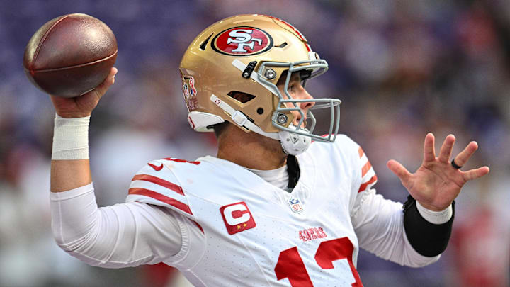 Sep 15, 2024; Minneapolis, Minnesota, USA; San Francisco 49ers quarterback Brock Purdy (13) warms up before the game against the Minnesota Vikings at U.S. Bank Stadium. Mandatory Credit: Jeffrey Becker-Imagn Images