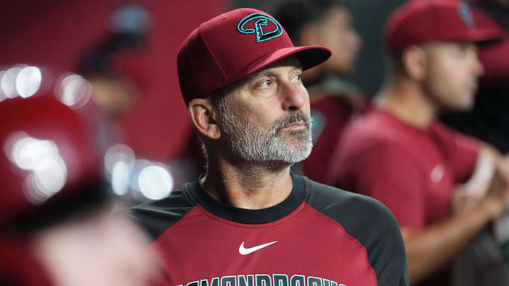 Arizona Diamondbacks manager Torey Lovullo watches his team from the dugout as they play the Seattle Mariners at Chase Field in Phoenix on June 10, 2025.