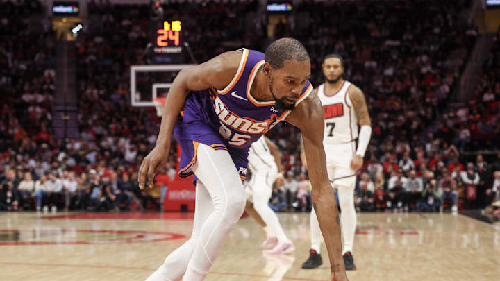 Feb 12, 2025; Houston, Texas, USA; Phoenix Suns forward Kevin Durant (35) grabs a rebound against Houston Rockets forward Cam Whitmore (7) in the second half at Toyota Center. Mandatory Credit: Thomas Shea-Imagn Images Feb 12, 2025; Houston, Texas, USA; Phoenix Suns forward Kevin Durant (35) grabs a rebound against Houston Rockets forward Cam Whitmore (7) in the second half at Toyota Center. Mandatory Credit: Thomas Shea-Imagn Images