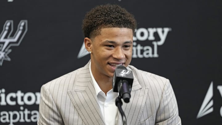 Jun 28, 2025; San Antonio, TX, USA; San Antonio Spurs first round draft pick Carter Bryant answers questions during press conference at Victory Capital Performance Center. Mandatory Credit: Scott Wachter-Imagn Images Jun 28, 2025; San Antonio, TX, USA; San Antonio Spurs first round draft pick Carter Bryant answers questions during press conference at Victory Capital Performance Center. Mandatory Credit: Scott Wachter-Imagn Images