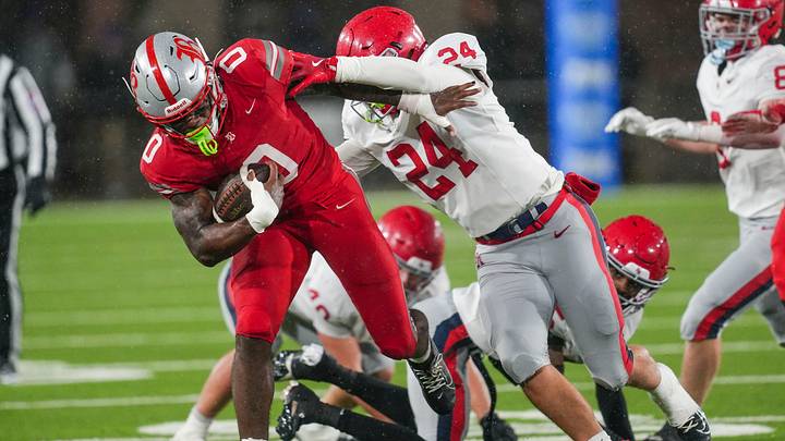 Brentwood Academy's Jamison Humphres (24) tackles Baylor's David Gabriel Georges (0) during the Division II-AAA championship game at Finley Stadium in Chattanooga, Tenn., on Dec. 4, 2025.