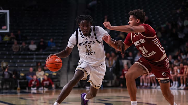 Jan 4, 2025; Atlanta, Georgia, USA; Georgia Tech Yellow Jackets forward Baye Ndongo (11) drives on Boston College Eagles forward Elijah Strong (31) in the second half at McCamish Pavilion. Mandatory Credit: Brett Davis-Imagn Images
