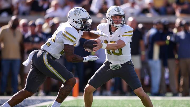 Oct 11, 2025; Atlanta, Georgia, USA; Georgia Tech Yellow Jackets quarterback Haynes King (10) hands the ball off to running back Trelain Maddox (22) against the Virginia Tech Hokies in the second quarter at Bobby Dodd Stadium at Hyundai Field. Mandatory Credit: Brett Davis-Imagn Images Oct 11, 2025; Atlanta, Georgia, USA; Georgia Tech Yellow Jackets quarterback Haynes King (10) hands the ball off to running back Trelain Maddox (22) against the Virginia Tech Hokies in the second quarter at Bobby Dodd Stadium at Hyundai Field. Mandatory Credit: Brett Davis-Imagn Images