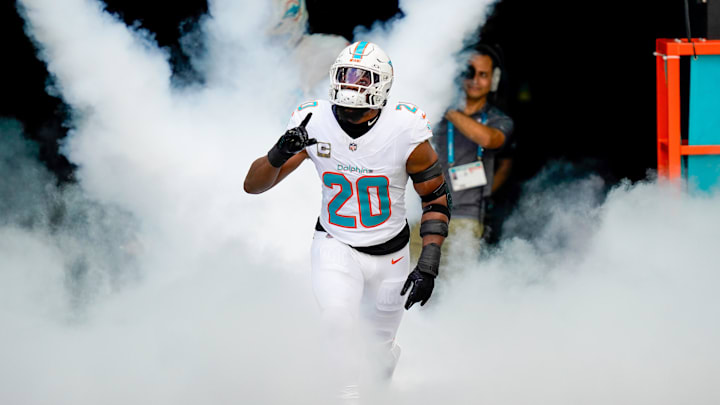 Miami Dolphins linebacker Jordyn Brooks (20) runs on the field before a game against the Buffalo Bills at Hard Rock Stadium. 