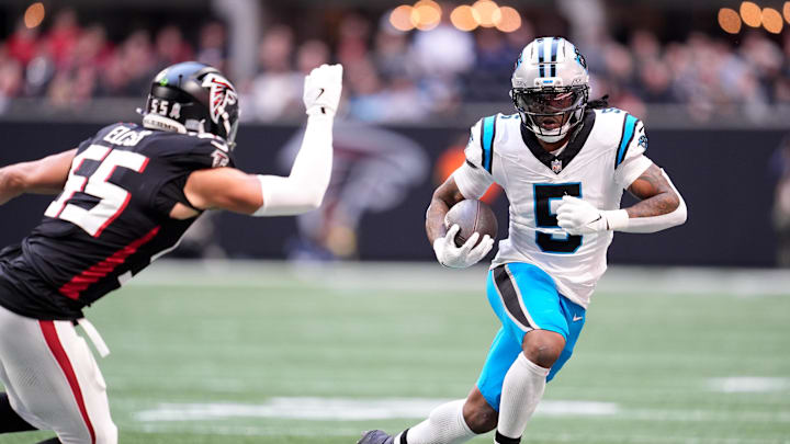 Nov 16, 2025; Atlanta, Georgia, USA;  Carolina Panthers running back Rico Dowdle (5) runs with the ball in the first quarter against the Atlanta Falcons at Mercedes-Benz Stadium. Mandatory Credit: Dale Zanine-Imagn Images