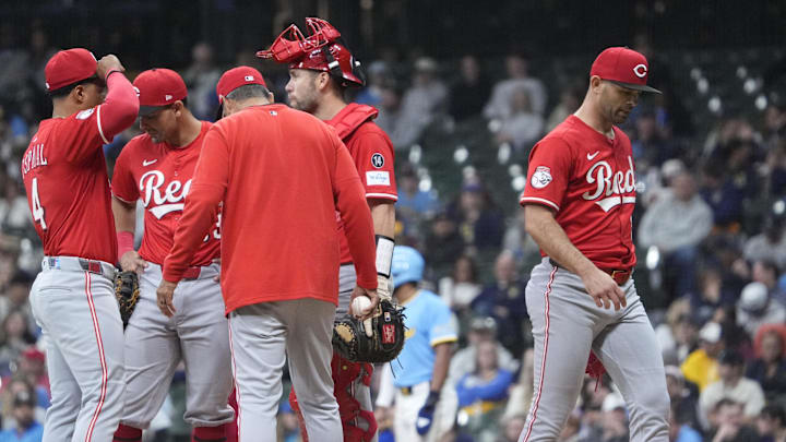 Apr 4, 2025; Milwaukee, Wisconsin, USA; Cincinnati Reds pitcher Nick Martinez (28) is taken out of the game by Cincinnati Reds manager Terry Francona (77) in the fifth inning at American Family Field. Mandatory Credit: Michael McLoone-Imagn Images