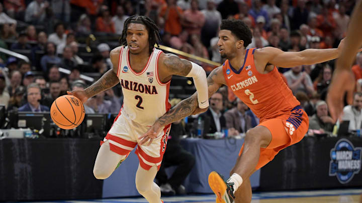 Mar 28, 2024; Los Angeles, CA, USA; Clemson Tigers guard Dillon Hunter (2) fouls Arizona Wildcats guard Caleb Love (2) in the second half in the semifinals of the West Regional of the 2024 NCAA Tournament at Crypto.com Arena. Mandatory Credit: Jayne Kamin-Oncea-Imagn Images