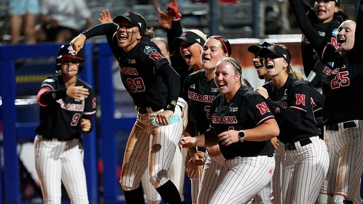 Nebraska celebrates the home run of Hannah Coor (23) in the eighth inning during a Women's College World Series softball game between the Arkansas Razorbacks and the Nebraska Cornhuskers at Devon Park in Oklahoma City, May 28, 2026. Nebraska celebrates the home run of Hannah Coor (23) in the eighth inning during a Women's College World Series softball game between the Arkansas Razorbacks and the Nebraska Cornhuskers at Devon Park in Oklahoma City, May 28, 2026.