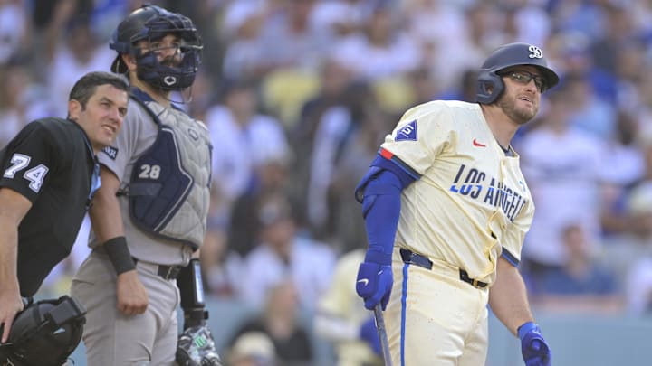 Los Angeles, California, USA; Los Angeles Dodgers third baseman Max Muncy (13) watches to see if his hit stays fair against the New York Yankees at Dodger Stadium. Los Angeles, California, USA; Los Angeles Dodgers third baseman Max Muncy (13) watches to see if his hit stays fair against the New York Yankees at Dodger Stadium.