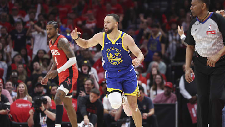 Apr 20, 2025; Houston, Texas, USA; Golden State Warriors guard Stephen Curry (30) reacts after scoring a basket during the third quarter against the Houston Rockets at Toyota Center. Mandatory Credit: Troy Taormina-Imagn Images