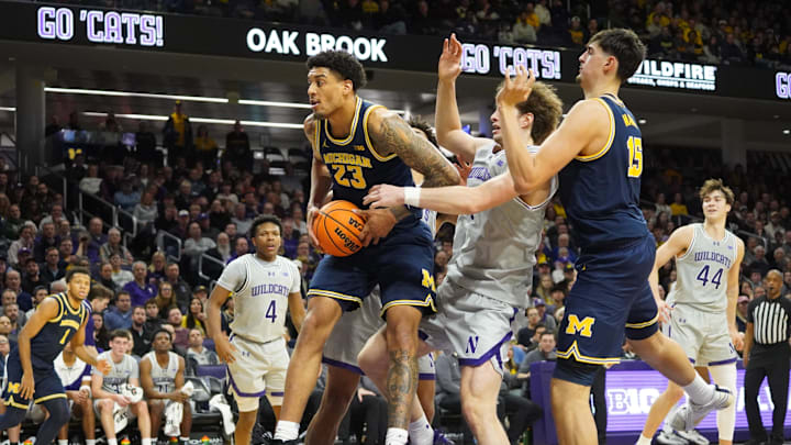 Feb 11, 2026; Evanston, Illinois, USA; Michigan Wolverines forward Yaxel Lendeborg (23) grabs a rebound against the Northwestern Wildcats during the first half at Welsh-Ryan Arena. Mandatory Credit: David Banks-Imagn Images