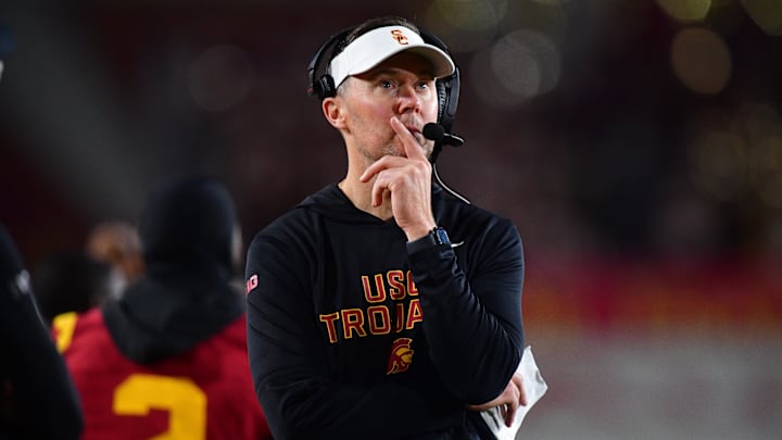 Nov 7, 2025; Los Angeles, California, USA; Southern California Trojans head coach Lincoln Riley watches game action against the Northwestern Wildcats during the second half at the Los Angeles Memorial Coliseum. Mandatory Credit: Gary A. Vasquez-Imagn Images Nov 7, 2025; Los Angeles, California, USA; Southern California Trojans head coach Lincoln Riley watches game action against the Northwestern Wildcats during the second half at the Los Angeles Memorial Coliseum. Mandatory Credit: Gary A. Vasquez-Imagn Images