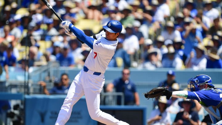Jun 16, 2024; Los Angeles, California, USA; Los Angeles Dodgers designated hitter Shohei Ohtani (17) hits a solo home run against the Kansas City Royals during the sixth inning at Dodger Stadium.