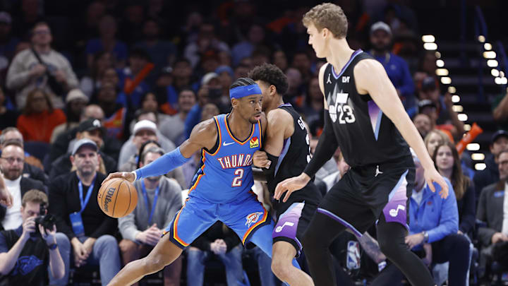 Jan 22, 2025; Oklahoma City, Oklahoma, USA; Oklahoma City Thunder guard Shai Gilgeous-Alexander (2) drives to the basket against the Utah Jazz during the second half at Paycom Center. Mandatory Credit: Alonzo Adams-Imagn Images