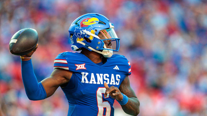 Oct 19, 2024; Kansas City, Missouri, USA; Kansas Jayhawks quarterback Jalon Daniels (6) passes the ball against the Houston Cougars during the third quarter at GEHA Field at Arrowhead Stadium. Mandatory Credit: William Purnell-Imagn Images Oct 19, 2024; Kansas City, Missouri, USA; Kansas Jayhawks quarterback Jalon Daniels (6) passes the ball against the Houston Cougars during the third quarter at GEHA Field at Arrowhead Stadium. Mandatory Credit: William Purnell-Imagn Images